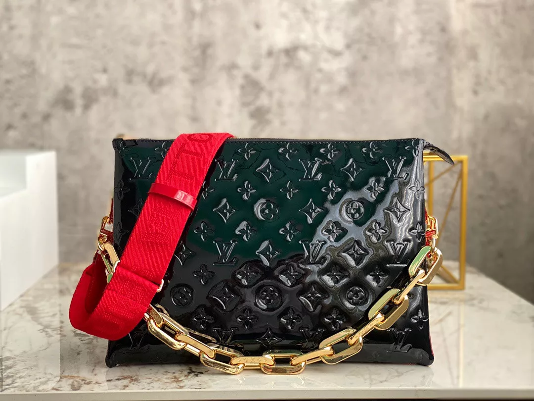 REP LOUIS VUITTON COUSSIN MM 0119